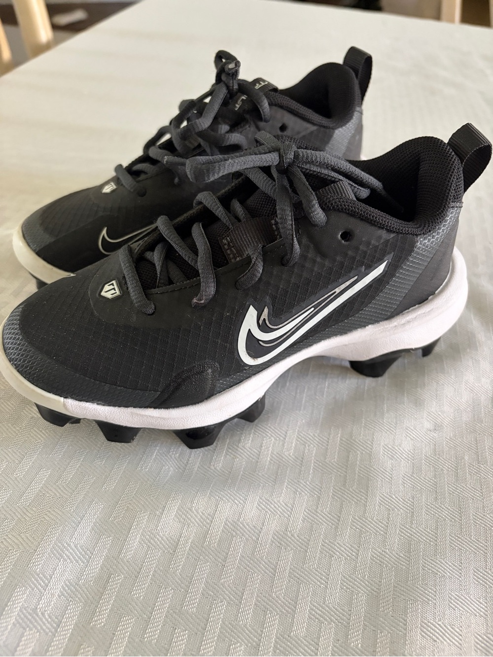 Nike Kids Black and White Cleats